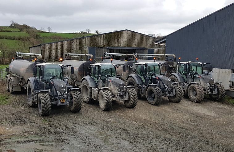 Gorthill Farm Contracting's black-liveried fleet featured in the Irish Tractor & Agri profile (industry-press photo of the business).